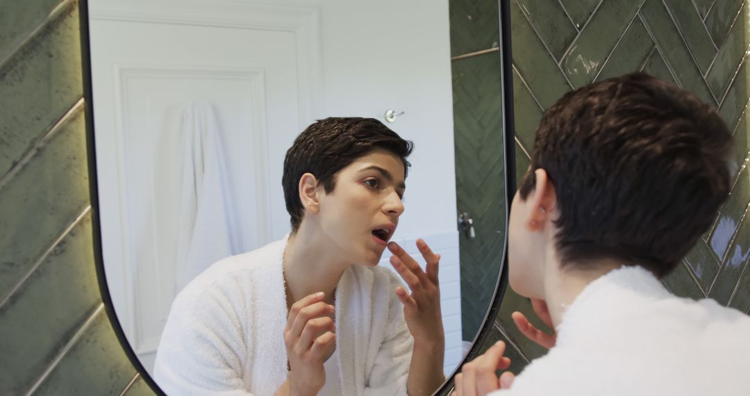 Woman Checking Skin in Mirror, Morning Beauty Routine - Free Images, Stock Photos and Pictures on Pikwizard.com