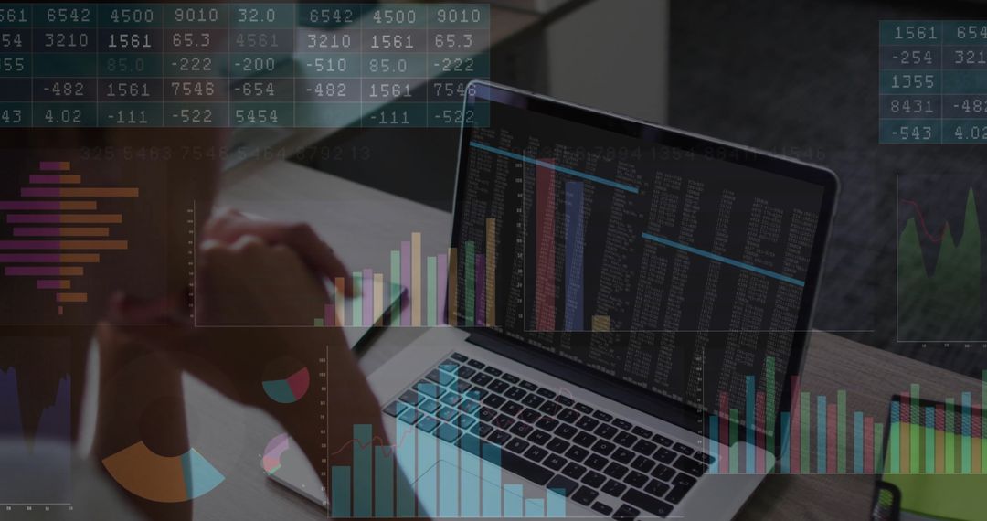Businesswoman Analyzing Financial Data on Laptop with Charts Displayed