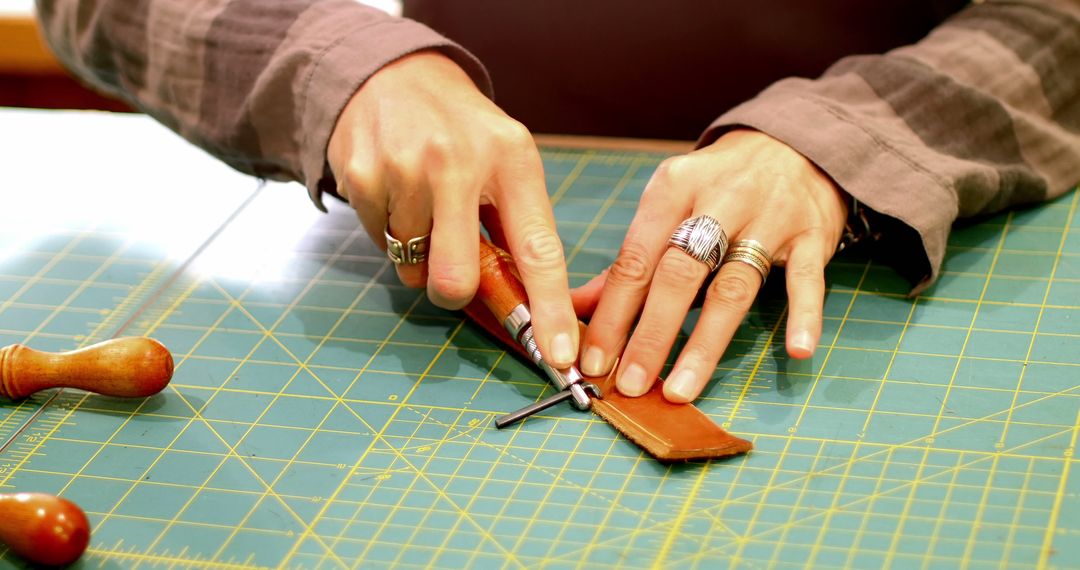 Craftsperson Cutting Leather in Artisan Workshop - Free Images, Stock Photos and Pictures on Pikwizard.com