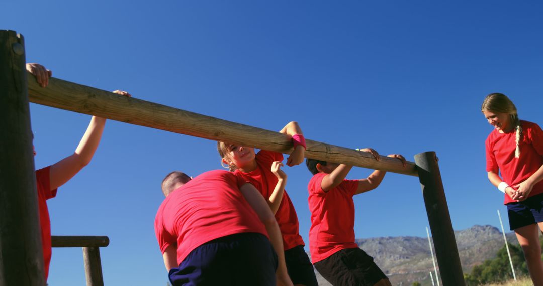 Group of Teenagers Exercising on Outdoor Obstacle Course - Free Images, Stock Photos and Pictures on Pikwizard.com