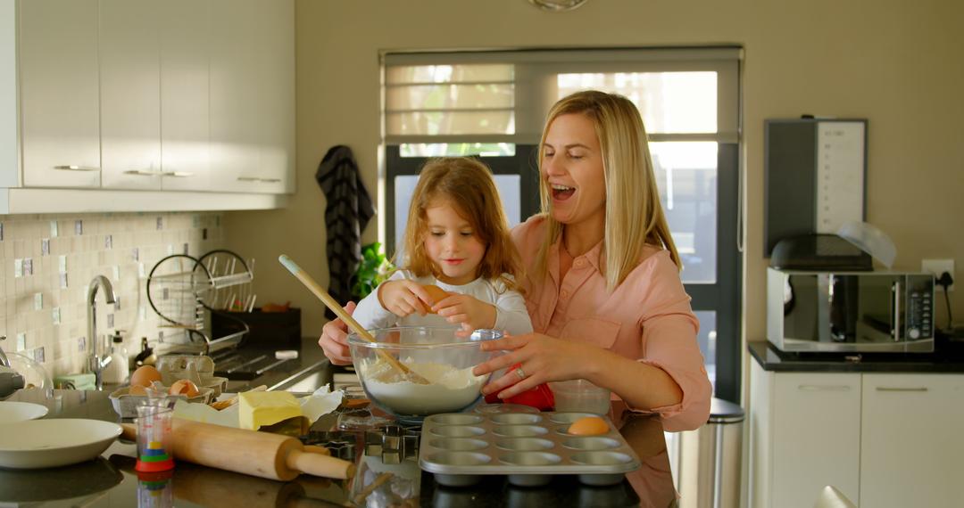 Mother and Daughter Baking in Modern Kitchen Together - Free Images, Stock Photos and Pictures on Pikwizard.com