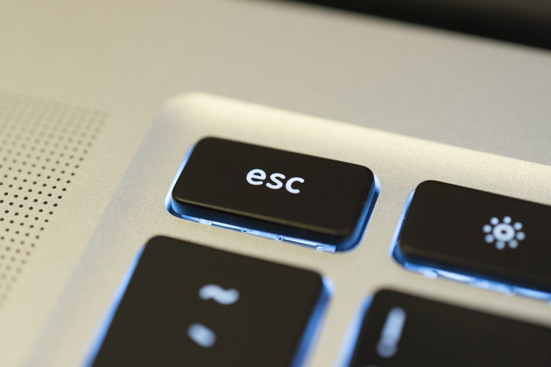 Close-up of Esc Key on Modern Laptop Keyboard with Lighting - Free Images, Stock Photos and Pictures on Pikwizard.com