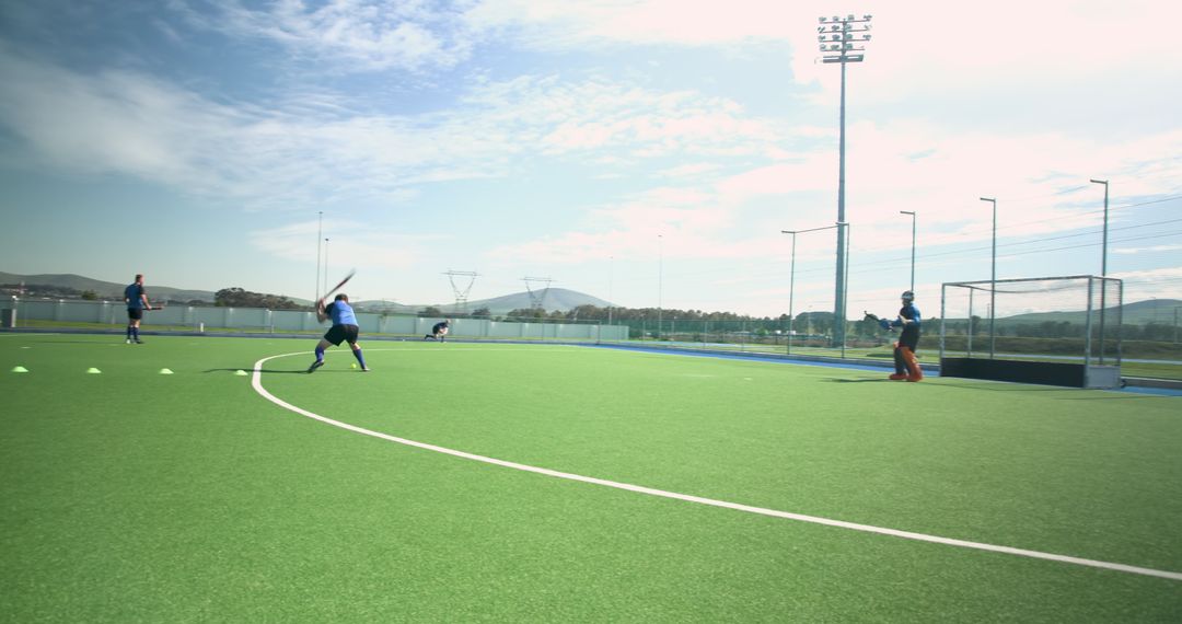 Field Hockey Training Session With Players Practicing Drills