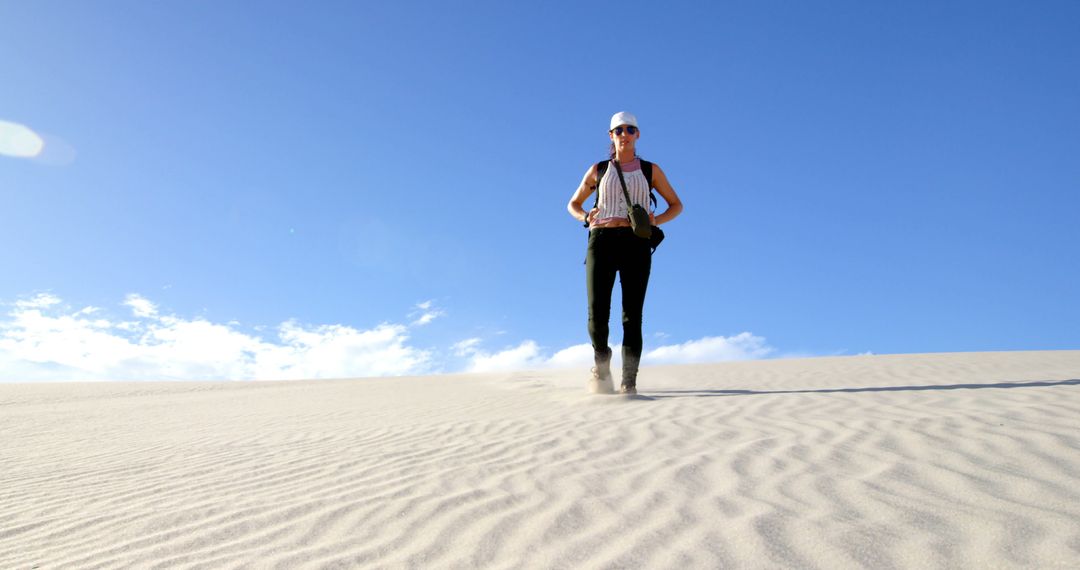 Adventurous Woman Exploring Vast Desert Bluescape