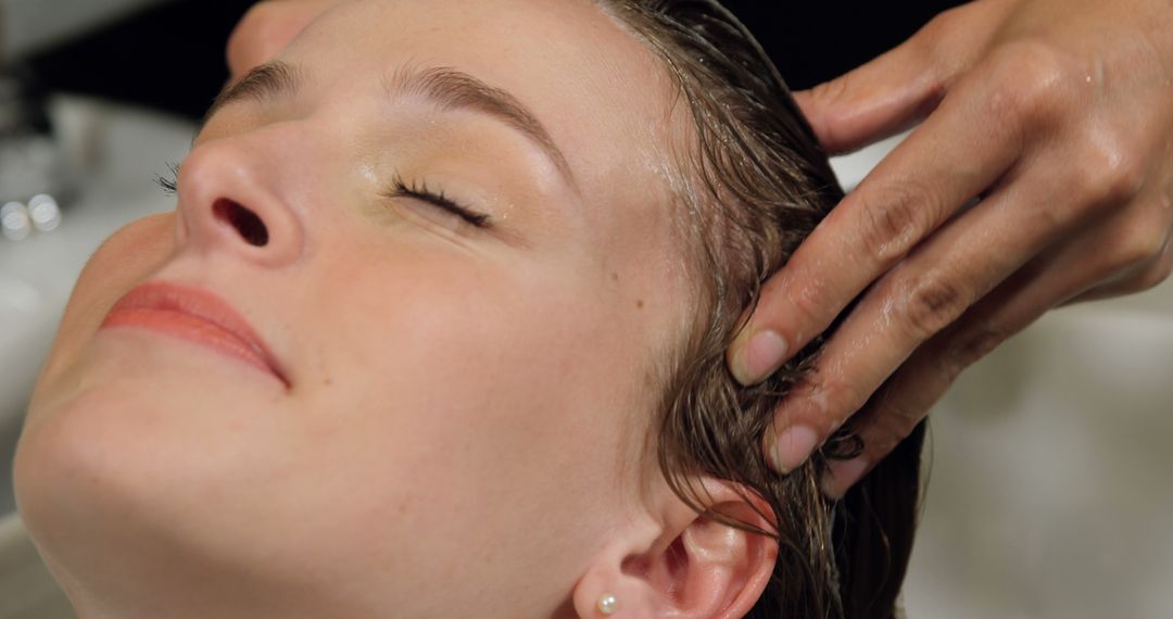 Close-Up Woman Enjoying Head Massage during Hair Wash - Free Images, Stock Photos and Pictures on Pikwizard.com