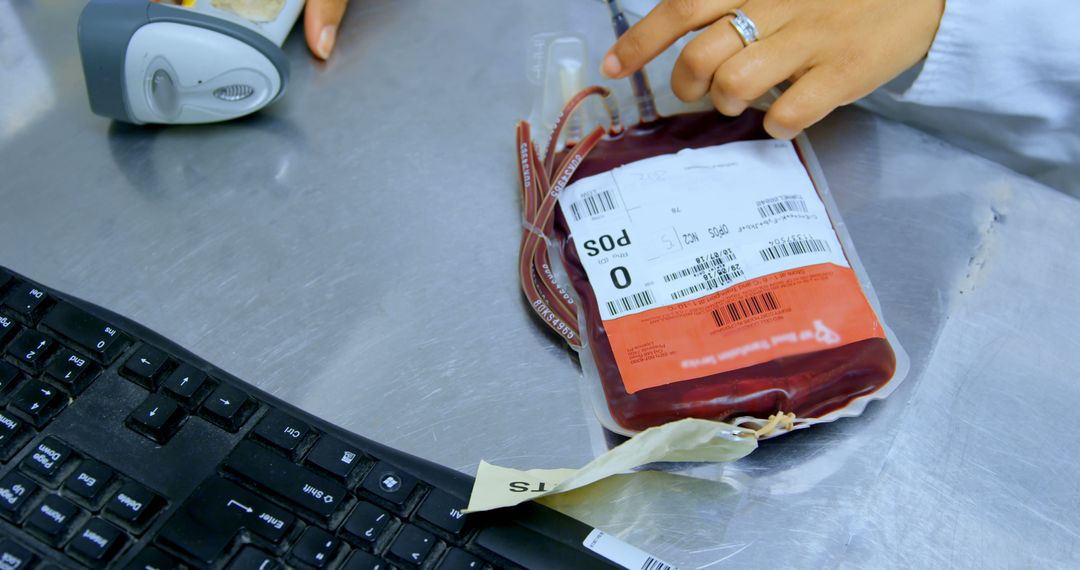 Blood Donation Concept with Blood Bag and Barcode Scanner - Free Images, Stock Photos and Pictures on Pikwizard.com