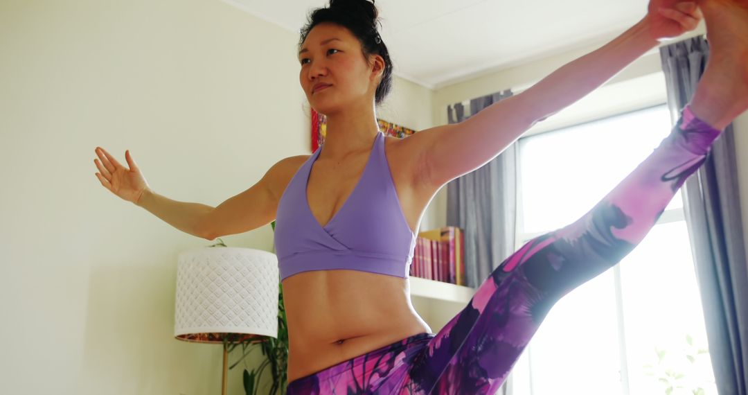 Woman Practicing Yoga at Home in Athletic Wear - Free Images, Stock Photos and Pictures on Pikwizard.com