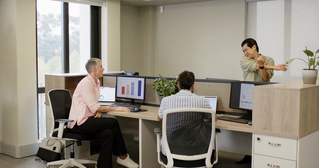 Modern Elegance: Multiracial Coworkers Engaging in Ergonomic Office Setting