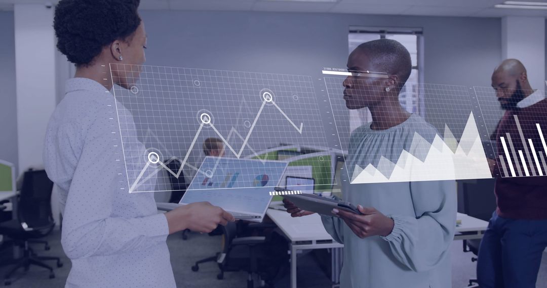 Colleagues Discuss Data Analytics in Modern Office