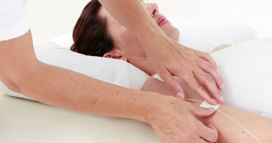 Woman Receiving Electrotherapy for Physical Rehabilitation - Free Images, Stock Photos and Pictures on Pikwizard.com