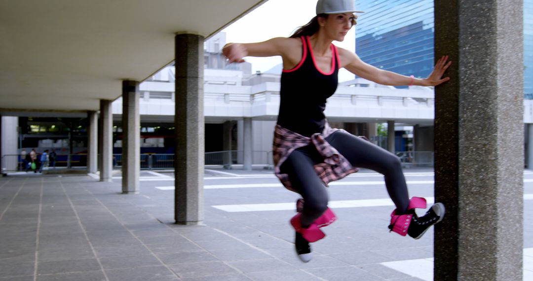 Woman Practicing Parkour in Urban Environment - Free Images, Stock Photos and Pictures on Pikwizard.com