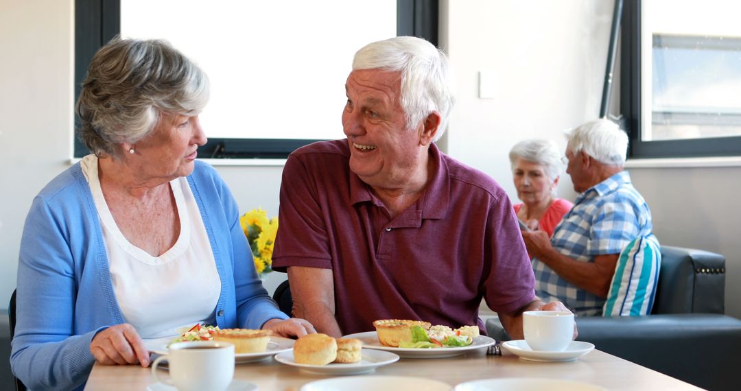 Senior Couple Engaging in Conversation During Breakfast Time
