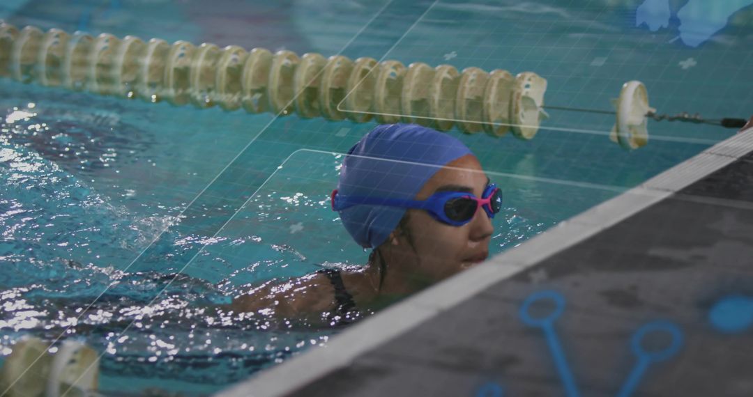 Swimmer Practicing at Indoor Lap Pool in Action Shot