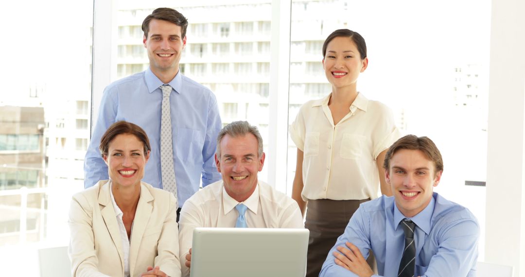 Diverse Business Team Smiling at Office Meeting