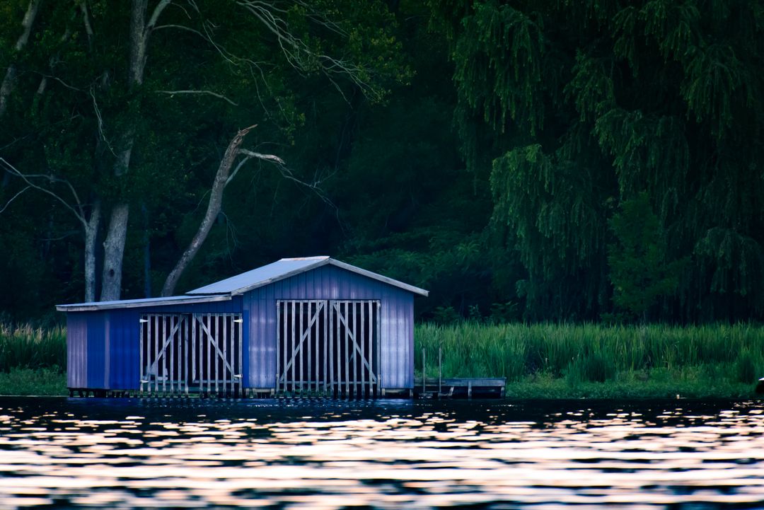Serene Lakeside Boathouse at Dusk - Free Images, Stock Photos and Pictures on Pikwizard.com