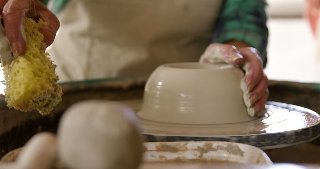 Close-Up of Artist Shaping Clay on Pottery Wheel - Free Images, Stock Photos and Pictures on Pikwizard.com