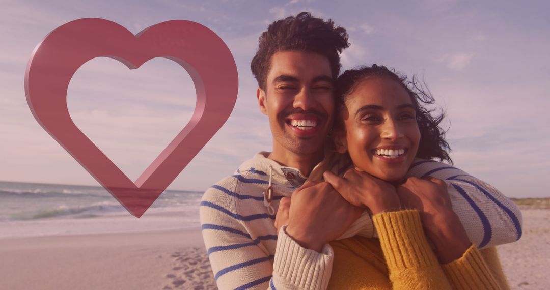 Joyful Couple Hugging on Beach with Heart Motif