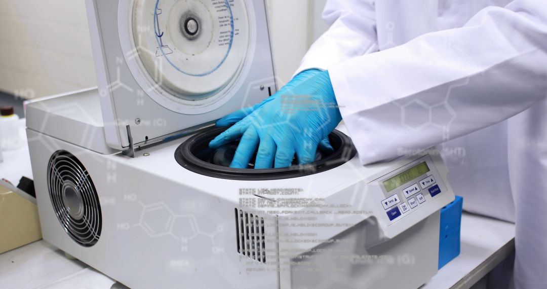 Scientist Operating Laboratory Centrifuge with Digital Interface