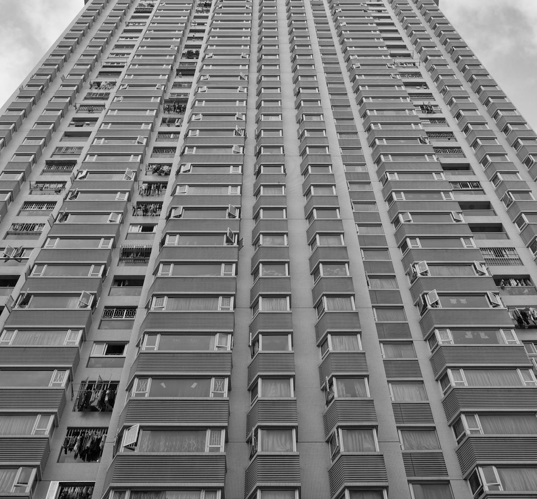 High-Rise Apartment Building in Black and White, Urban Architecture - Free Images, Stock Photos and Pictures on Pikwizard.com
