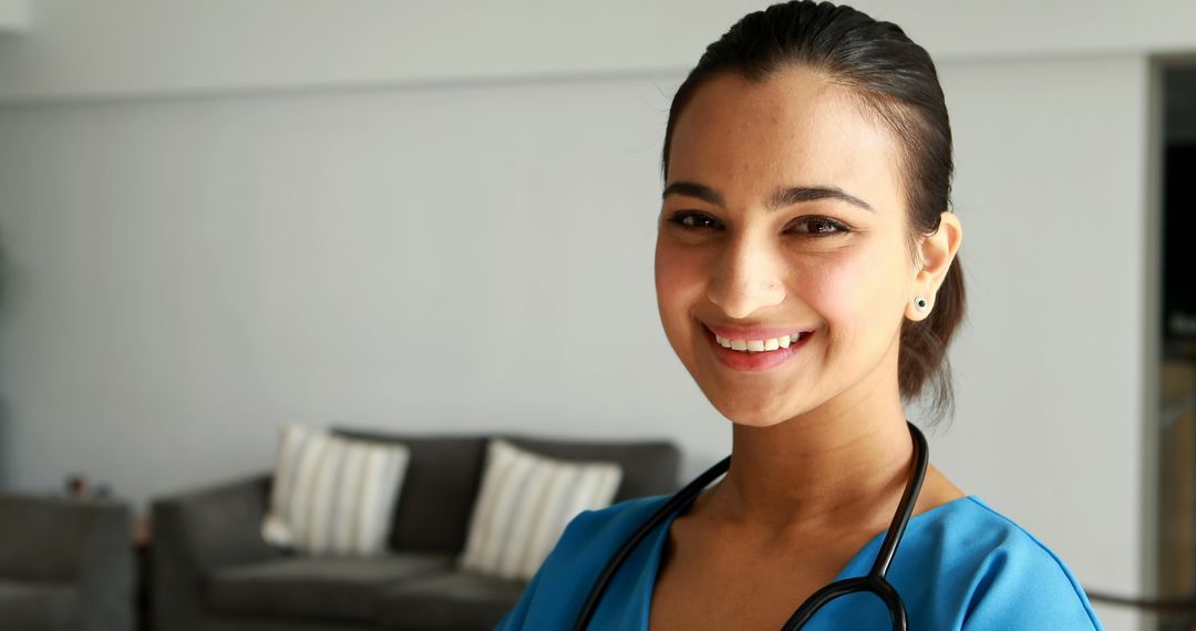 Smiling Female Doctor with Stethoscope in Hospital Environment
