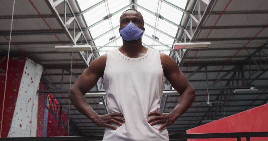 Athlete in Gym Wearing Face Mask, Ready for Workout - Free Images, Stock Photos and Pictures on Pikwizard.com