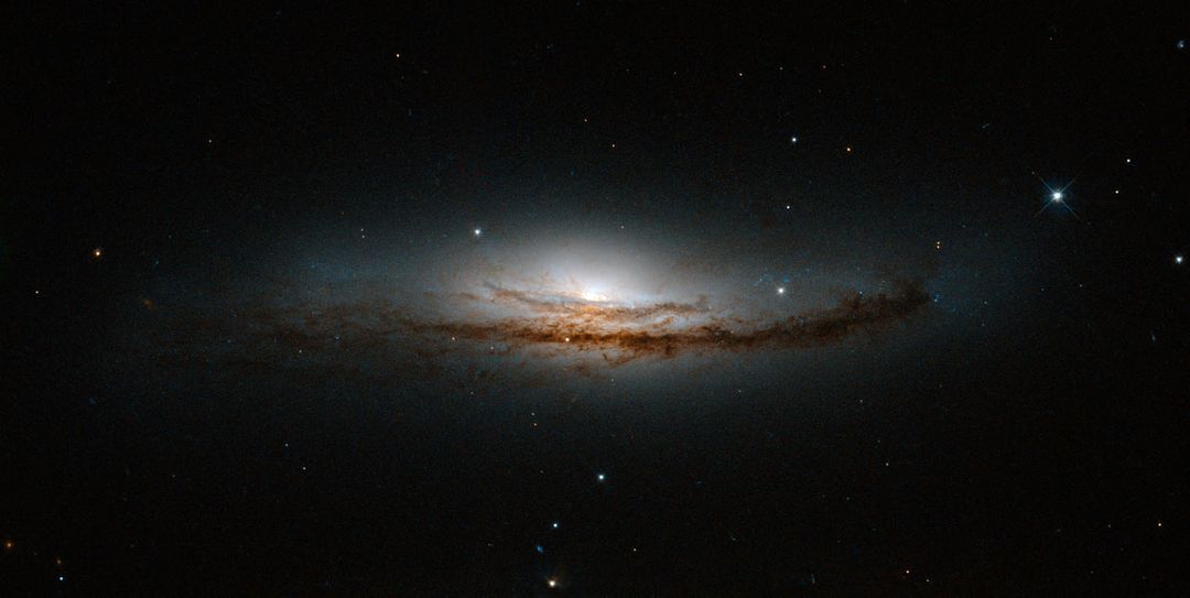 Hubble Peers at the Heart of a Spiral Galaxy - Free Images, Stock Photos and Pictures on Pikwizard.com