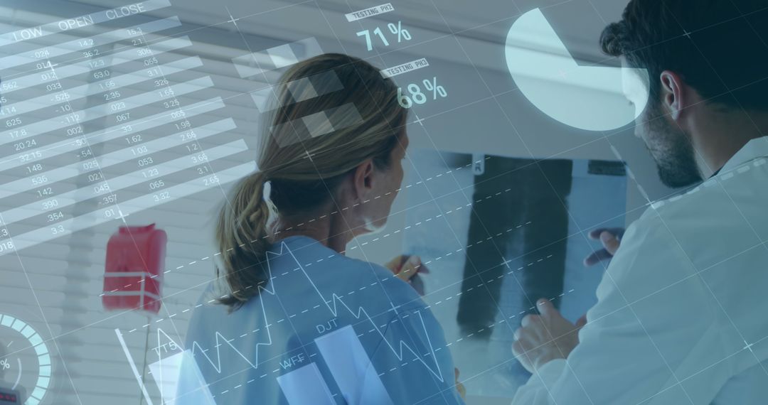 Doctors Analyzing X-ray with Digital Infographic Data Overlays