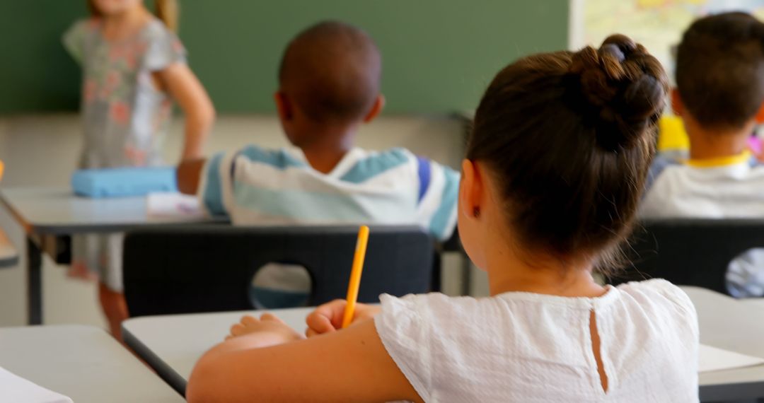 Schoolchildren engaging in classroom applause