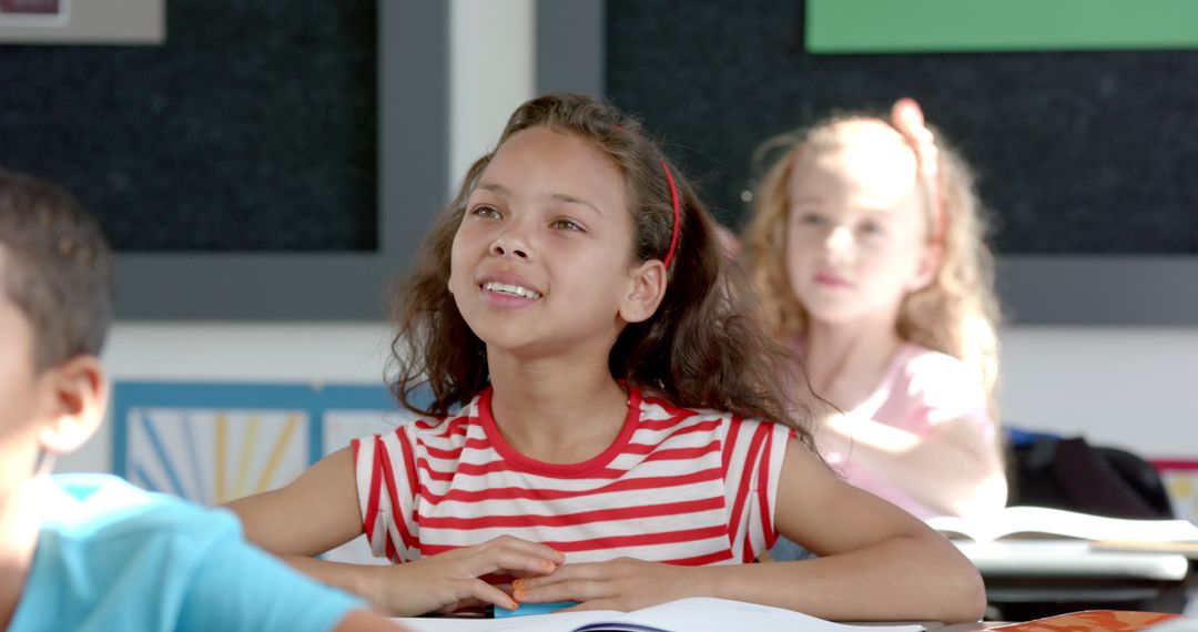Smiling student in classroom engaged in learning
