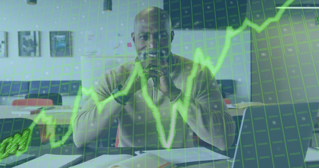 Businessman Analyzing Stock Market Data with Graph Overlay - Free Images, Stock Photos and Pictures on Pikwizard.com