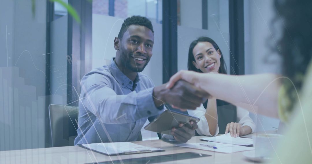 Businessman Shaking Hands in Modern Office Negotiation