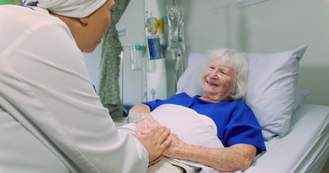 Nurse Comforting Elderly Patient in Hospital Room - Free Images, Stock Photos and Pictures on Pikwizard.com