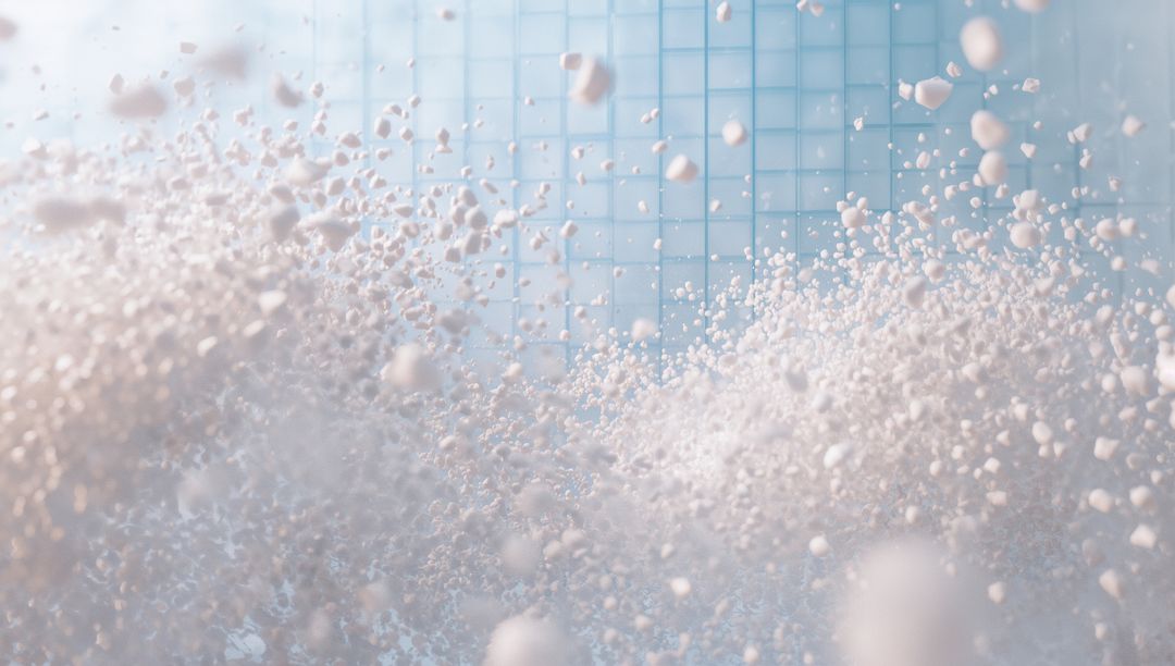 Dynamic Splash of White Foam Against Light Blue Tiled Background