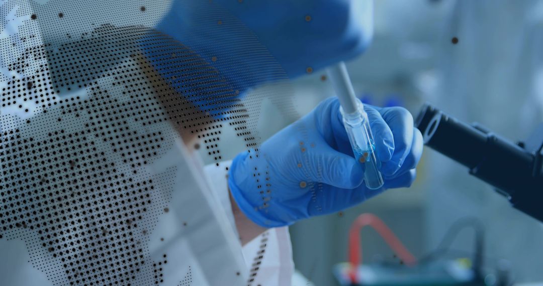 Transferring sample with pipette into vial in PPE, microscope with world map overlay