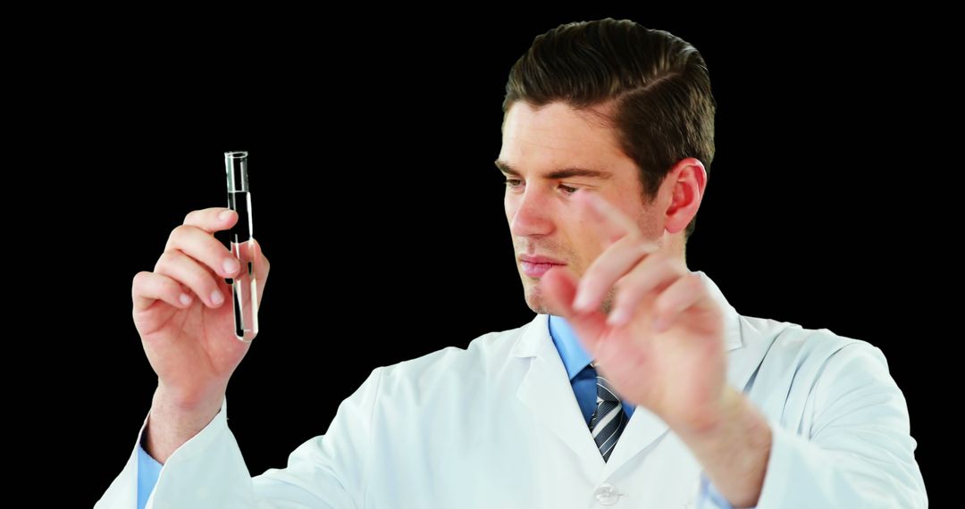 Scientist Examining Test Tube in Laboratory - Free Images, Stock Photos and Pictures on Pikwizard.com