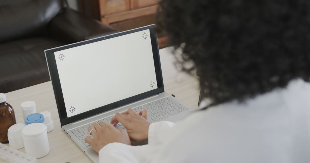 Scientist Using Laptop for Medical Research in Laboratory - Free Images, Stock Photos and Pictures on Pikwizard.com