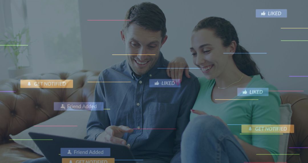 Couple Engaged with Digital World on Laptop in Contemporary Home