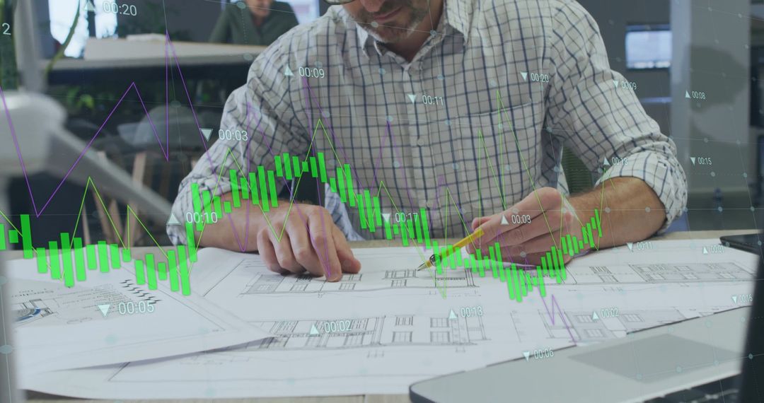 Architect Working on Blueprints with Data Overlays