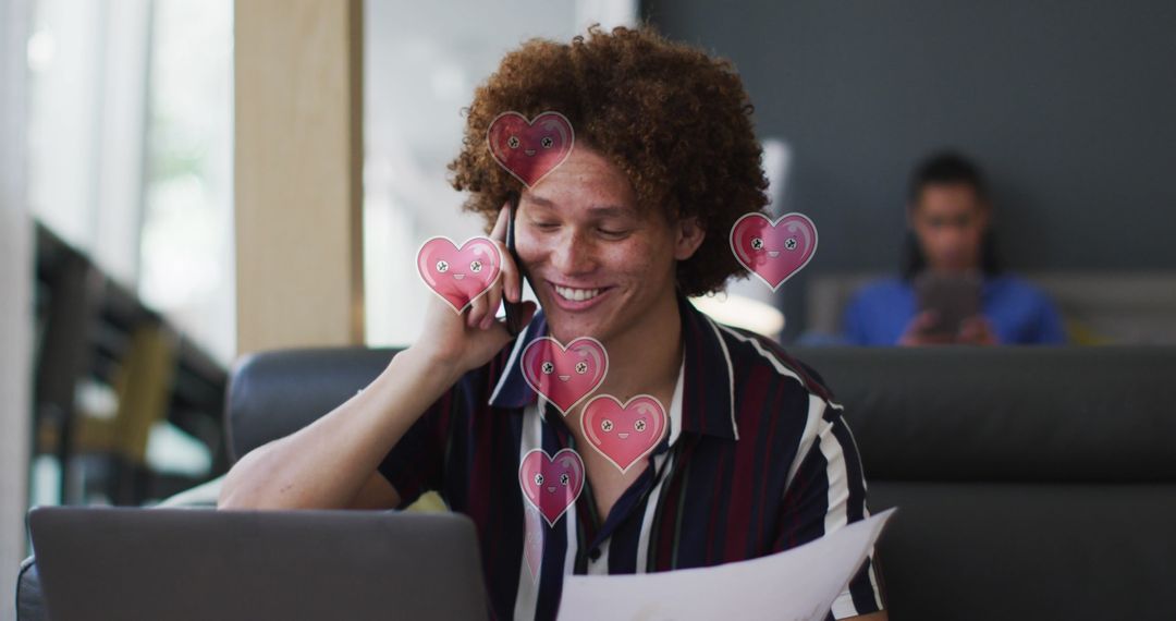 Happy Businessman Networking on Smartphone with Hearts Graphics