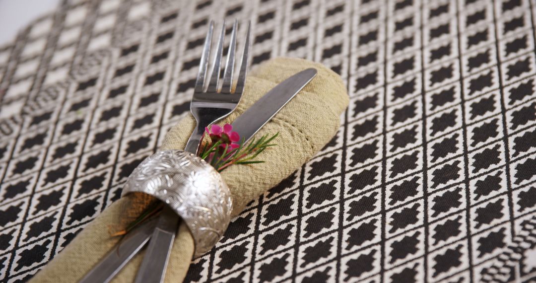 Elegant Table Setting with Silverware and Decorated Napkin Holder - Free Images, Stock Photos and Pictures on Pikwizard.com