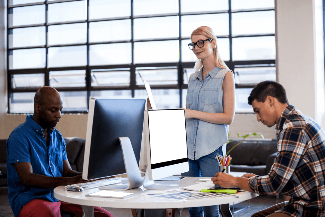 Transparent Collaboration in Modern Office Space with Diverse Team