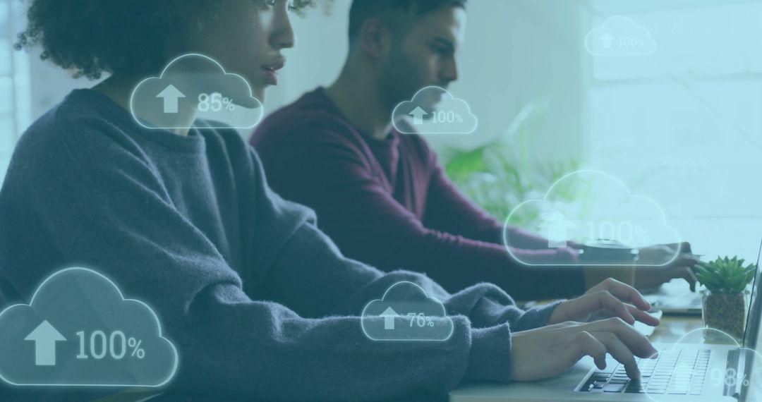 Diverse Team Engaging in Cloud Data Management in Office