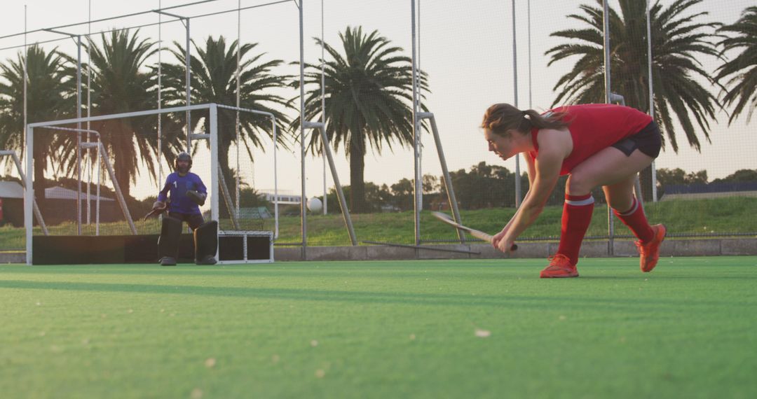 Female Field Hockey Player Preparing for Shot on Goal During Match - Free Images, Stock Photos and Pictures on Pikwizard.com