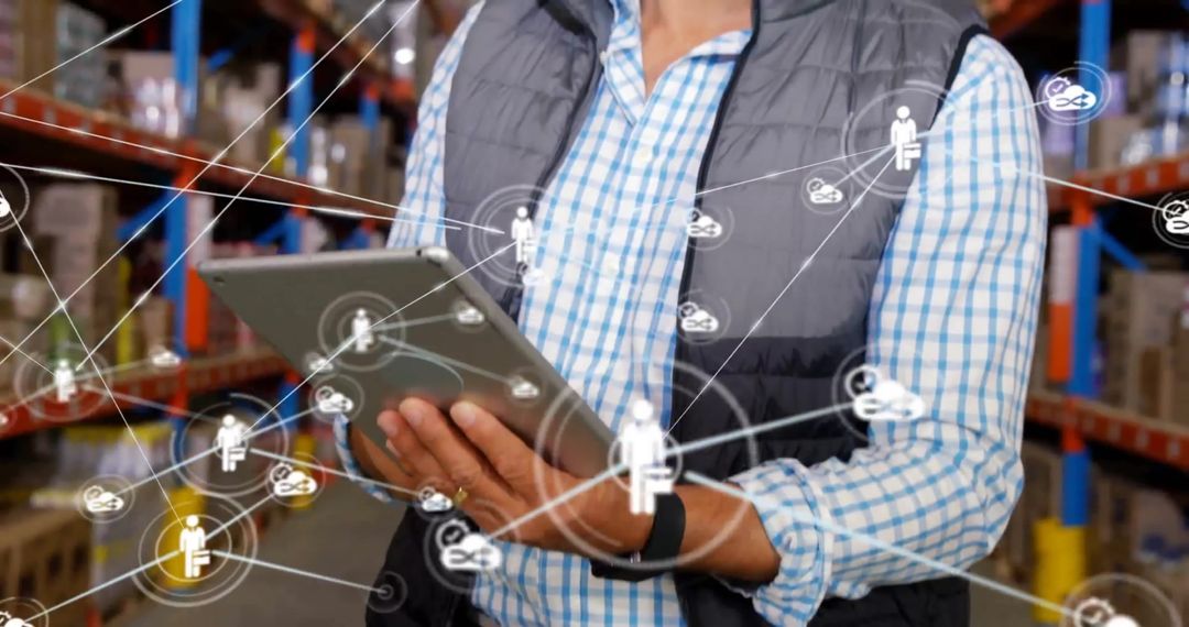 Warehouse Manager Using Tablet with Network Icons