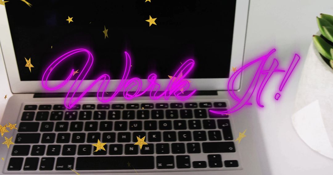 Modern Laptop With Neon Work It Text and Golden Stars