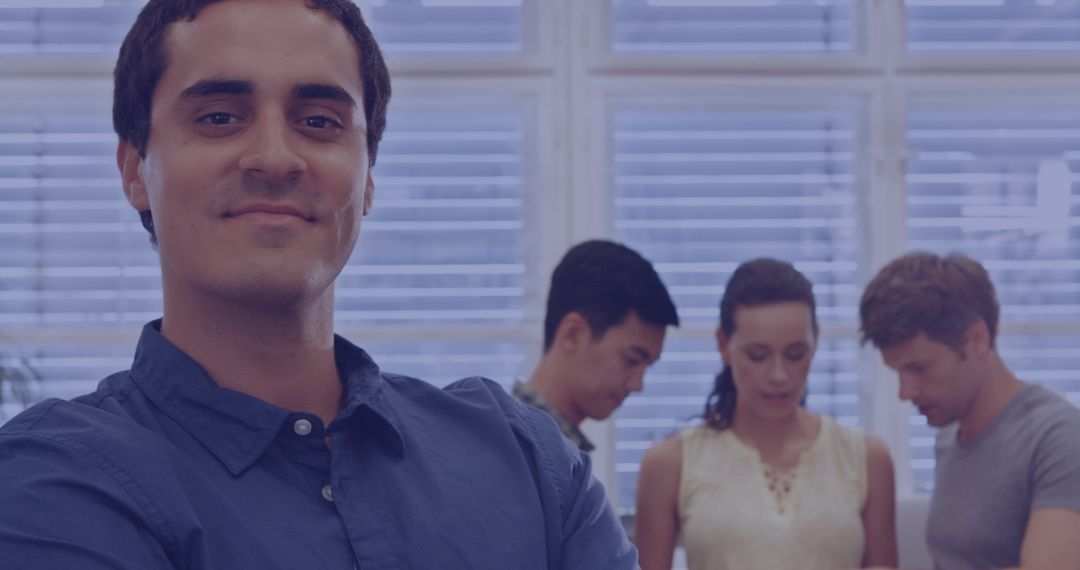 Confident Professional with Team Collaborating in Background