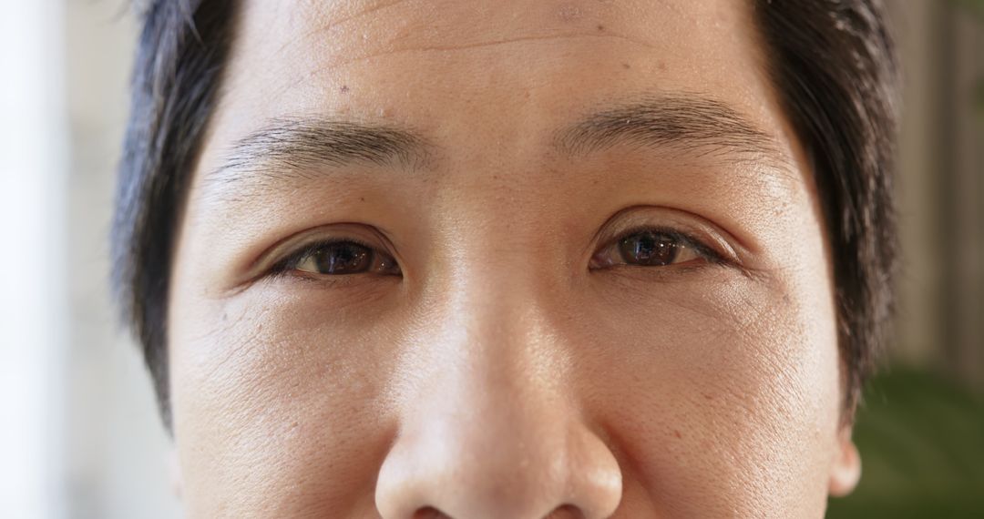 Close-Up of Man's Face Highlighting Skin Texture in Natural Light