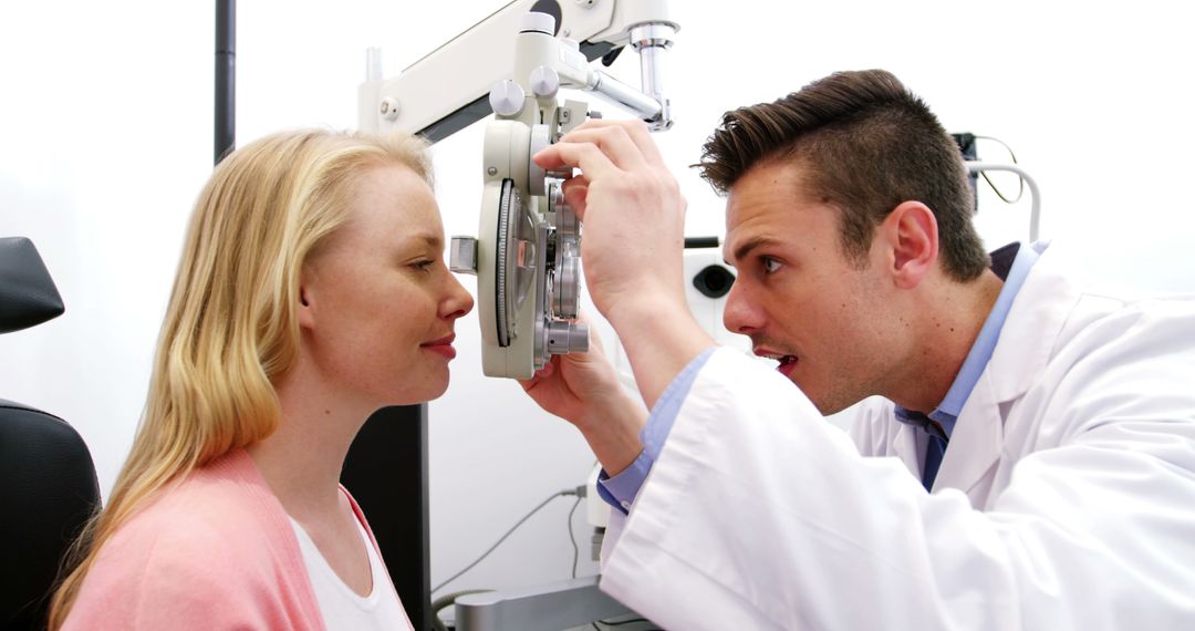 Optometrist Examining Patient's Eyes in Clinic - Free Images, Stock Photos and Pictures on Pikwizard.com