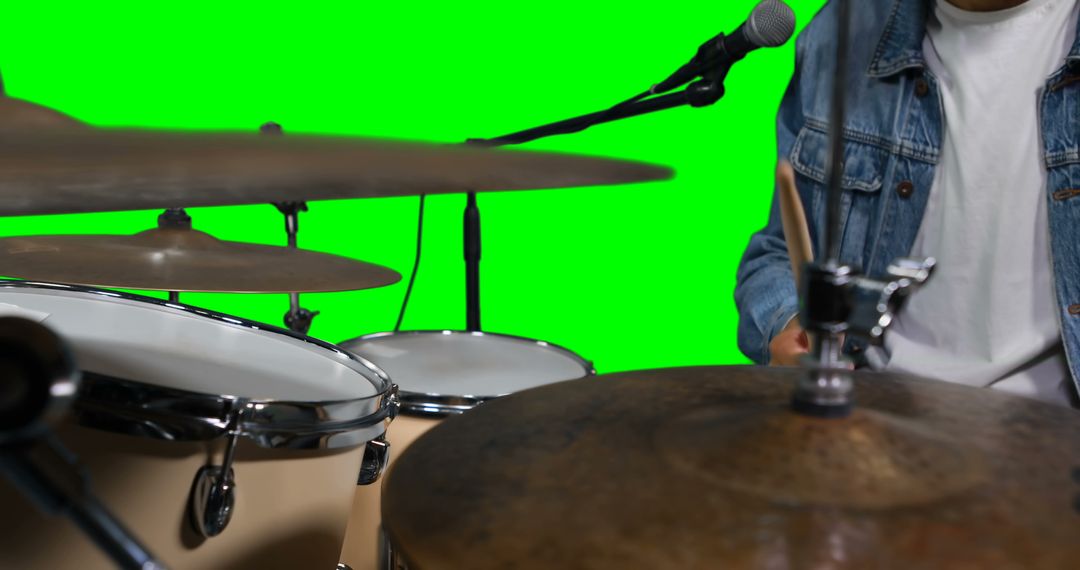 Drummer Playing Drum Set with Green Screen Background - Free Images, Stock Photos and Pictures on Pikwizard.com