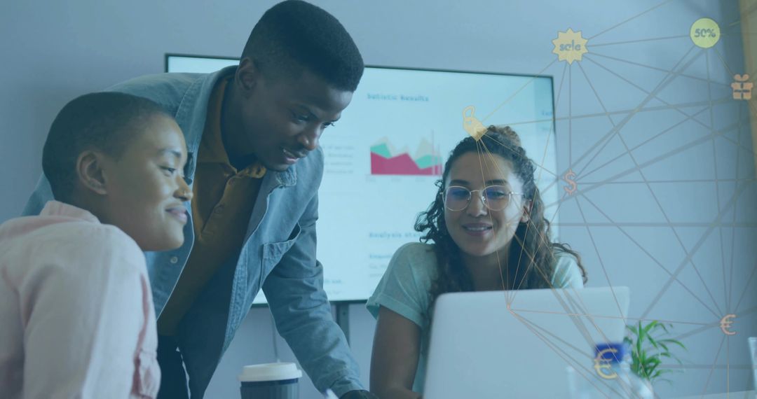 Diverse Coworkers Analyzing Data Together in Modern Office